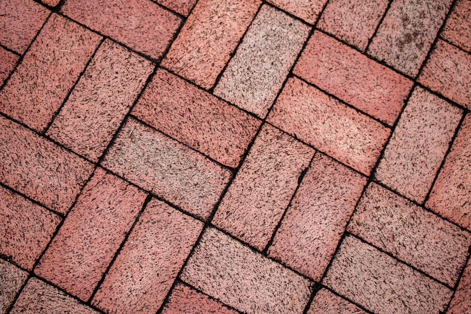 Close-up herringbone paver pattern detail
