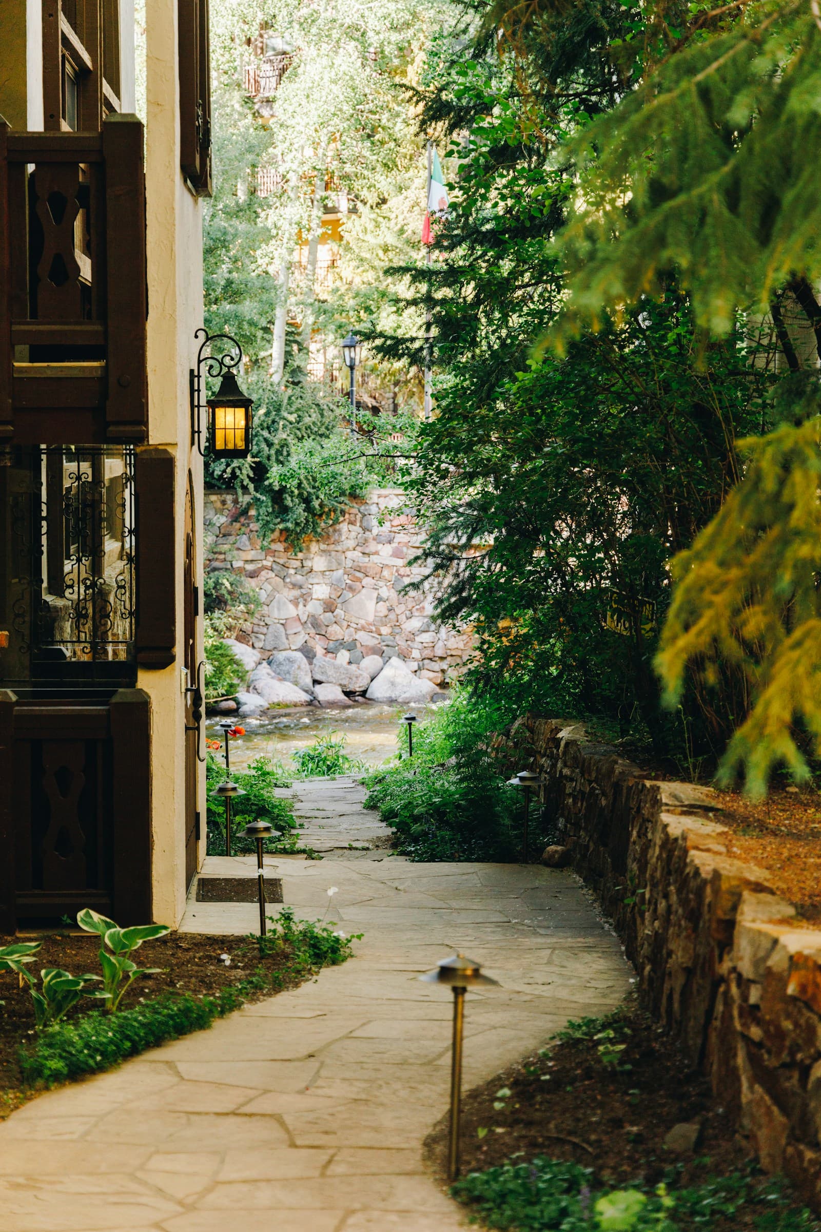 Stone path alongside garden retaining wall